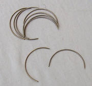 Curved slipping needles