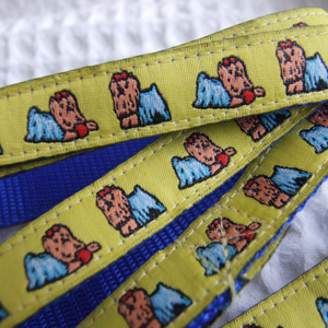 photo of Yorkie Yellow on Blue Woven Lead